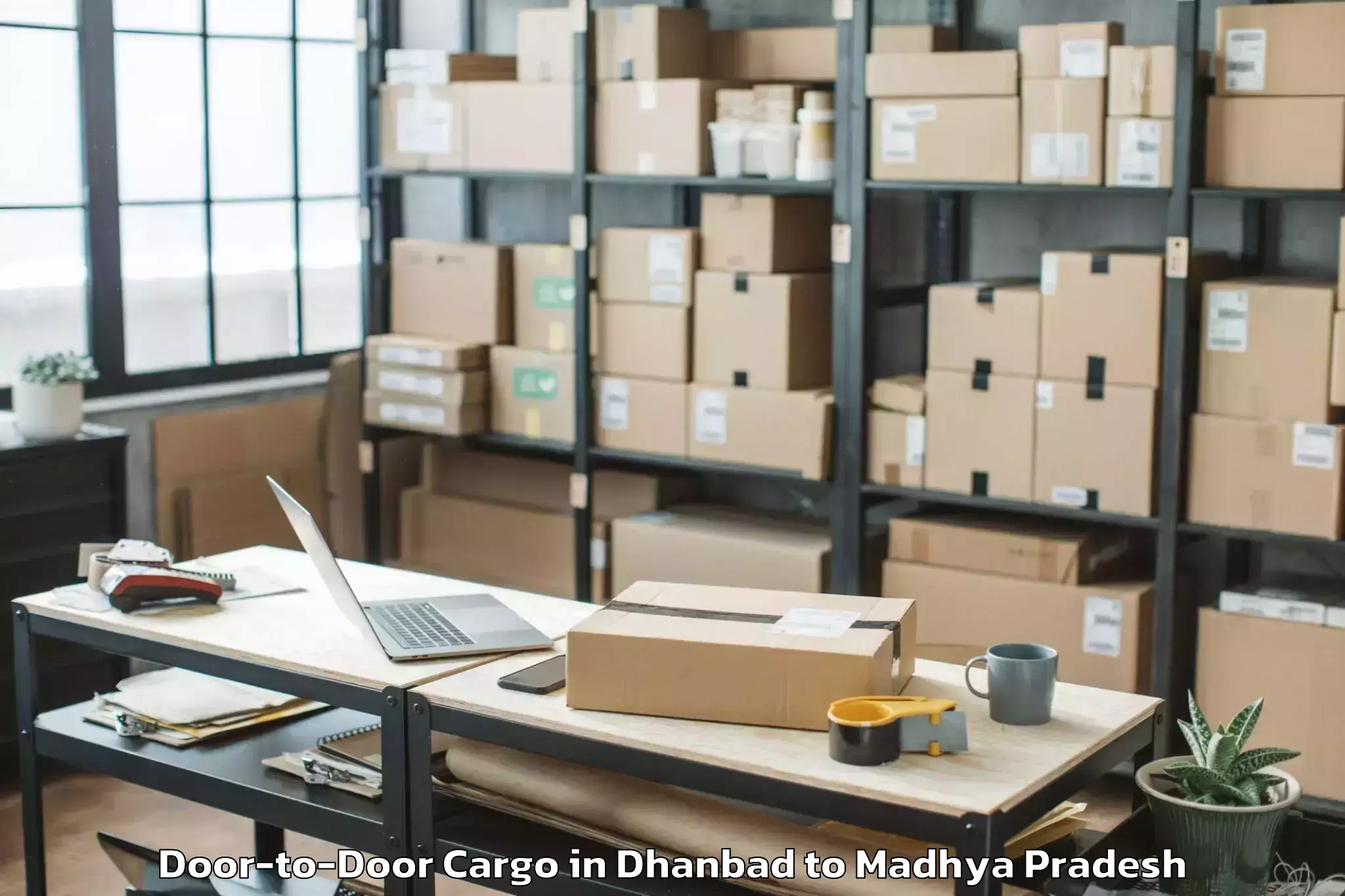 Leading Dhanbad to Panna Door To Door Cargo Provider